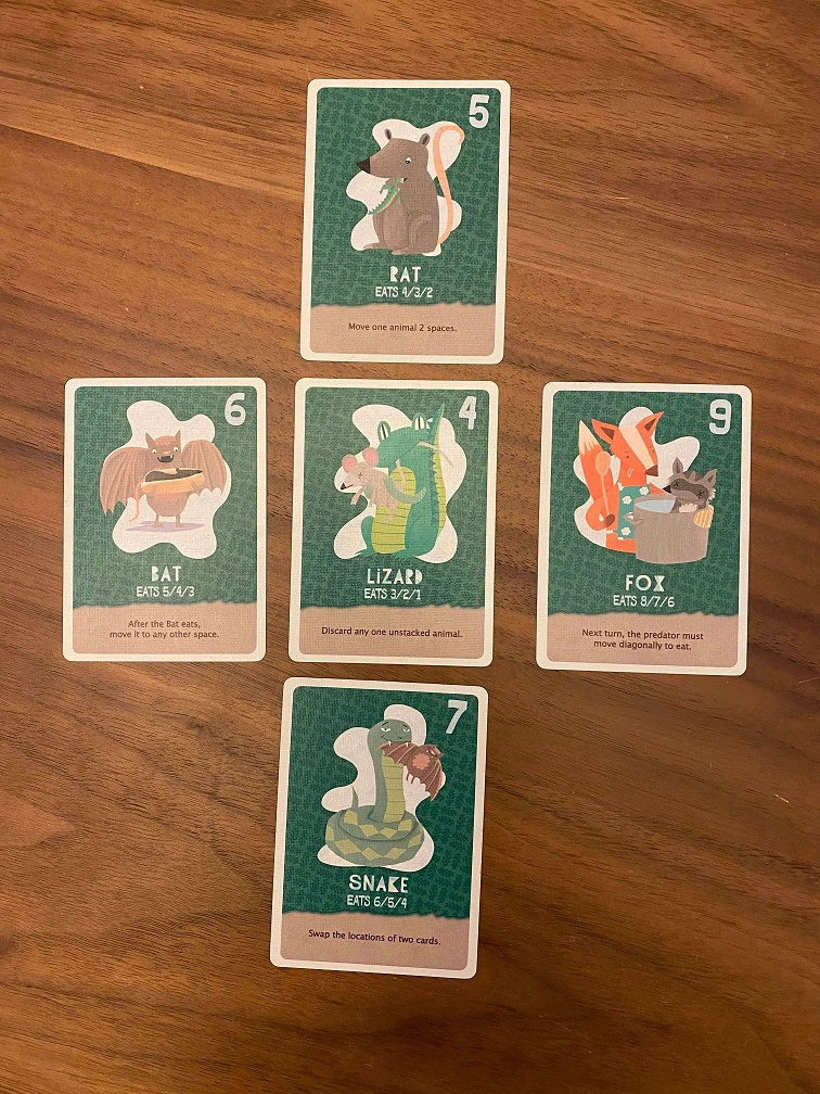 5 land creatures are arranged in a "plus" shape where 4 creatures are adjacent to the central one.