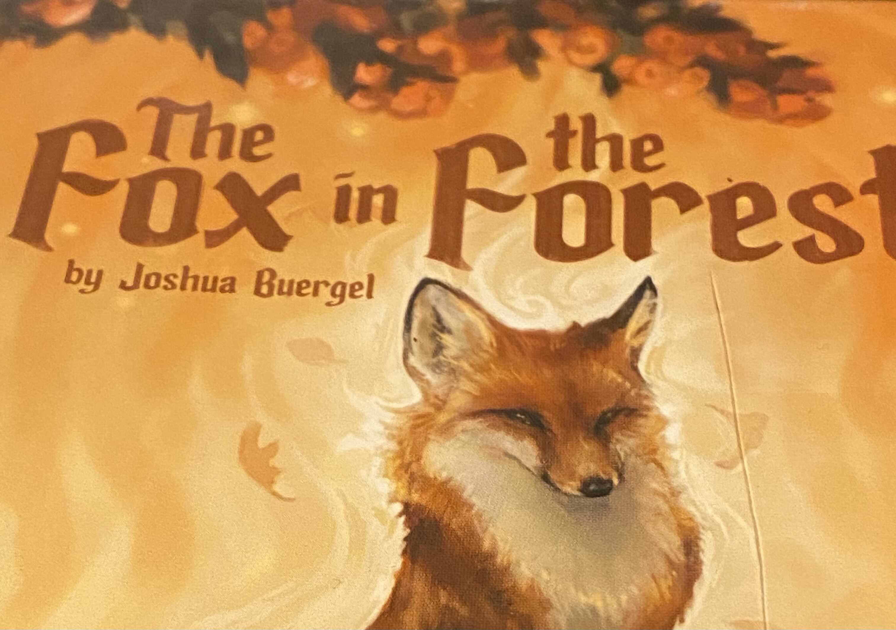 The Title "The Fox in the Forest" sits above a Fox, sitting proudly